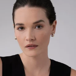 Shop Two-Tone Flute Huggie Earrings Huggie Earrings