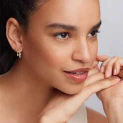 Shop Two-Tone Huggie Earrings Two-Tone