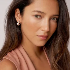 Shop Two-Tone Pearl Huggie Earrings Pearl