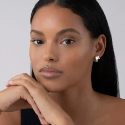 Shop White Topaz Huggie Earring Caviar Earrings